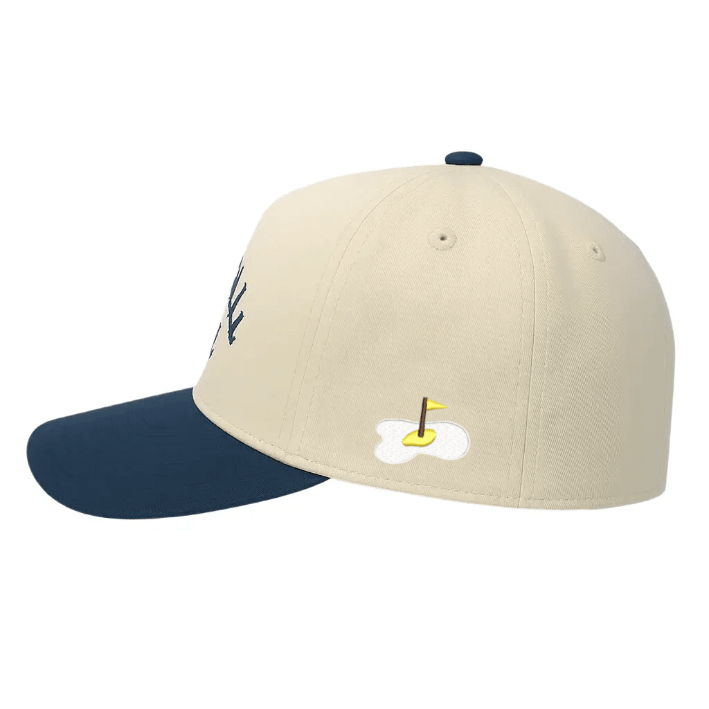 navy golf cap with a golf-themed design