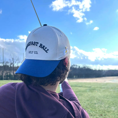 man swinging golf club