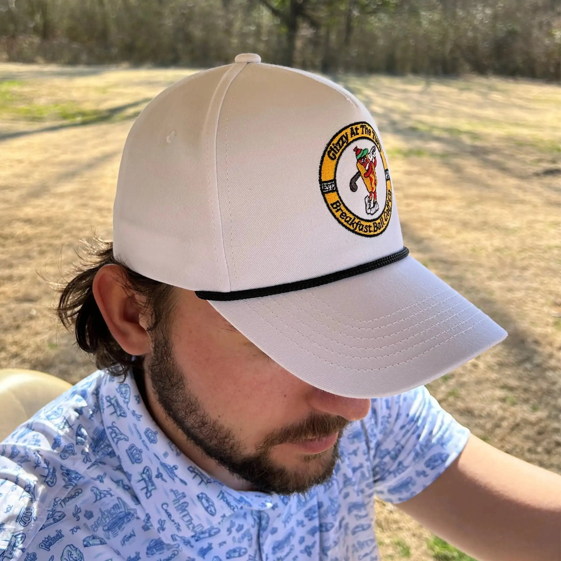 golfer in hot dog hat